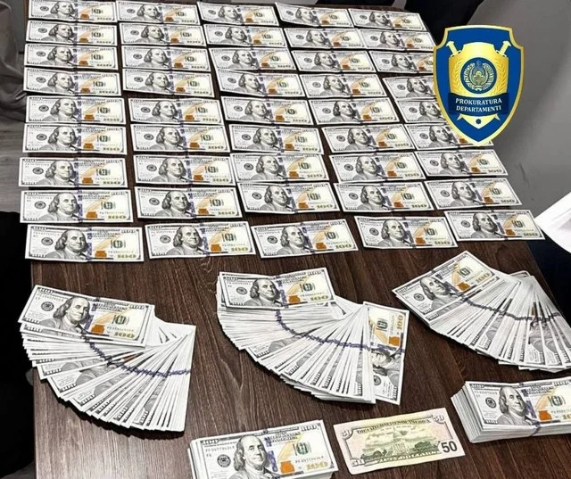 Америка учун 51 минг доллар: Тошкентда икки шахс қўлга олинди