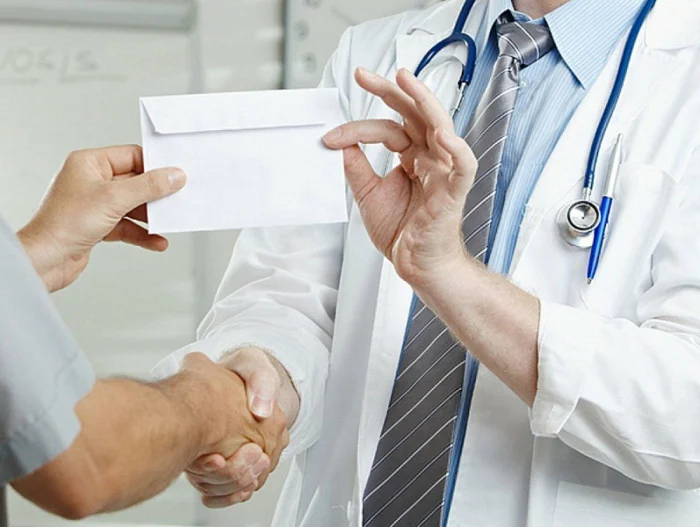 Ногирон шахсдан пора олаётган шифокор қўлга олинди